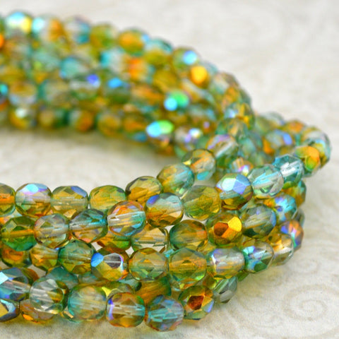 AMBER GARDEN 6mm Faceted Round Czech Glass Beads Qty 25 or 50 Fire Polished /Topaz Aqua Blue Mix with AB Aurora Borealis Finish